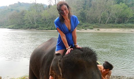 Traveled to the other side of the world!  Sarina riding Elephants on land and water when in Luang Prabang, Laos.  GAdventures SE Asia Trip 2/2012 - 3/2012